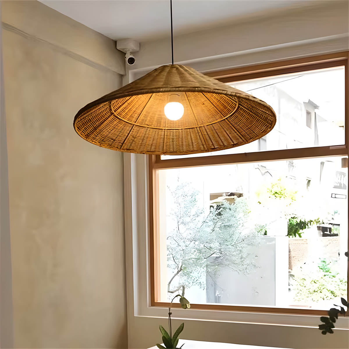 Conical hand-woven rattan & iron pendant light