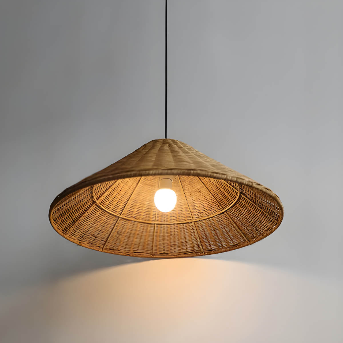 Conical hand-woven rattan & iron pendant light