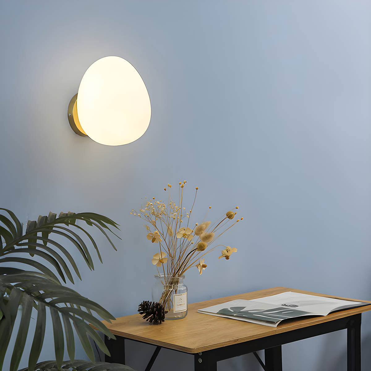 Egg-Shaped Glass Wall Light Metal Base Indoor Wall Sconce